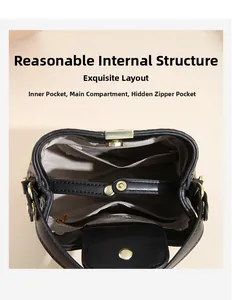 Close-up of bucket bag interior featuring main pocket with snap and zipper pocket