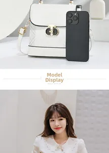 White flap crossbody bag with diamond texture and gold-black clasp shown with a smartphone