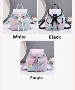 Three mini backpacks in white, black and purple featuring star patterns and front pockets