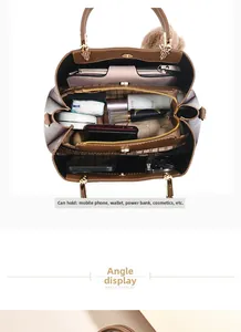Top view of spacious brown tote bag interior showing multiple compartments and storage