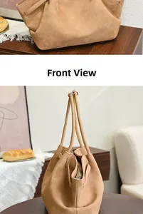 Detail view of khaki suede tote bag with soft texture and stylish folded cloud-like closure