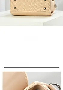 Detail of minimalist beige messenger bag featuring woven texture and metal bottom studs