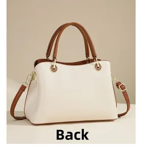 Back view of elegant two-tone tote bag with cream leather and brown straps