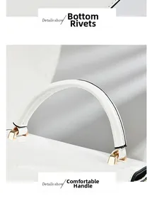 Detail view of white patent leather bag showing bottom metal studs and handle