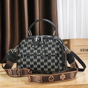 Sac bandoulière vintage chic avec imprimé géométrique et large bandoulière tissée