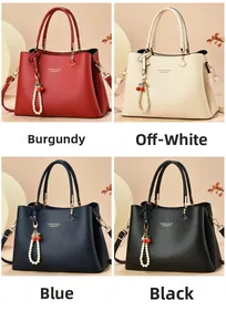 Litchi pattern leather handbags in burgundy, white, blue, and black with pearl charms
