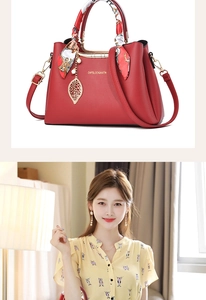 Detailed view of a red lychee-textured bridal tote bag with a silk scarf and leaf charm