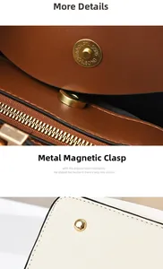 Detailed macro view of the gold magnetic closure and hardware on this brown leather bag