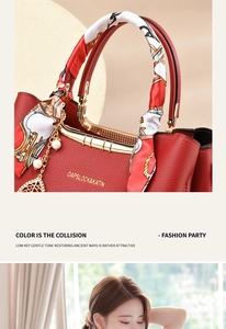 Detail of red wedding tote bag with gold handles, silk scarf, and pearl accessories