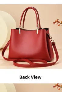 Rear view of large capacity red leather handbag featuring textured lychee grain finish