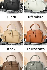 Detail view of multi-color crossbody bags with pebbled texture and patterned wide straps