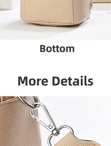 Close-up of beige pebble grain leather texture and durable silver metal hardware buckles