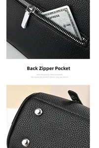 Detail of black pebbled leather handbag featuring back zipper pocket and metal base studs