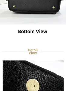 Détails des pieds en métal doré et du fermoir magnétique sur un sac noir grainé