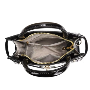 Black glossy crocodile texture tote bag with organized interior compartments and gold zipper