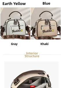 Detail view of the interior compartment and detachable printed strap of this stylish boston bag