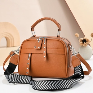 Brown lychee leather tote with chevron strap and silver hardware for women