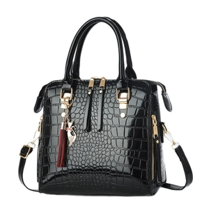 Glossy black crocodile pattern faux leather handbag with golden cat tassel pendant