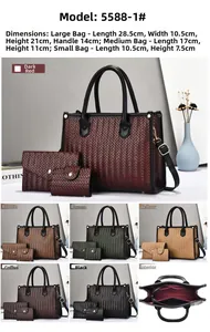 Detaillierte Ansicht des dreiteiligen Handtaschen-Sets mit Webstruktur und Innenfächern