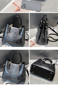 Detail views of snake pattern faux leather handbag with protective gold metal feet