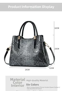 Detailed view of snake skin print handbag showing dimensions 29cm and interior compartments