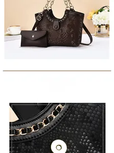 Detail view of large dark brown crocodile pattern tote bag with matching small pouch