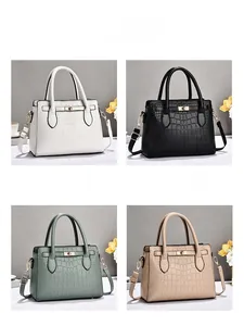 Sélection de couleurs pour sacs à main gaufrés crocodile avec fermoirs dorés