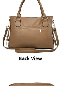 Detailed back view of a brown pebbled faux leather tote bag with a zip pocket and gold hardware