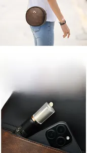 Détail du sac rond en PU marron montrant la poche avant pour téléphone et noeud doré