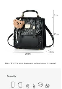 Detailed view of black PU leather backpack showing woven textures and size dimensions