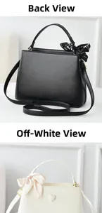 Rear view of elegant minimalist bucket bags in black and beige with silk scarf handle detail