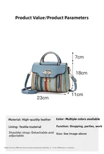 Close-up of woven handbag with golden swan clasp and adjustable leather shoulder strap
