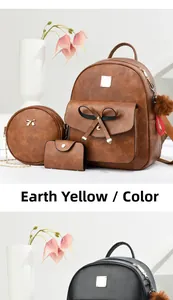 Vue détaillée du lot de 3 sacs à dos en cuir PU jaune terre et noir avec texture litchi