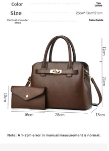 Brown litchi grain leather handbag set with gold twist lock and envelope clutch