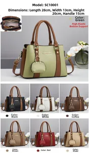 Detailed view of color-block tote bag with pebble leather texture and inner compartments