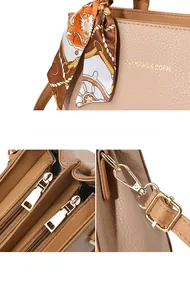 Dettaglio borsa beige con grana litchi, finiture dorate e scomparti interni con cerniera