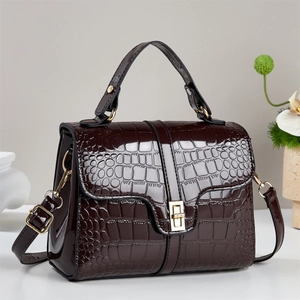 Retro dark brown crocodile pattern glossy leather handbag with gold twist lock closure