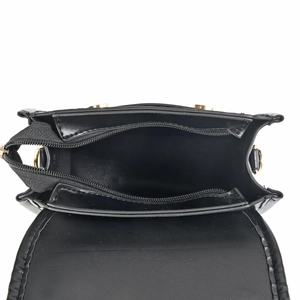 Minimalist vintage black crossbody bag with gold hardware and interior zipper view