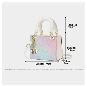 Detailed view of gradients on floral crossbody bag with dimensions 19x15x8 cm