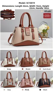 Detail view of large color-block handbag with lychee texture and 32x14x22cm dimensions