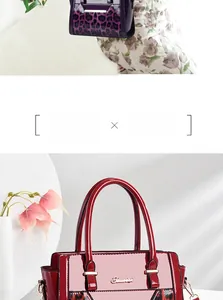 Detail of purple and red leopard print tote bag with metallic logo and sturdy handle