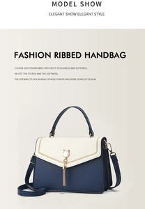 Close-up of textured sheepskin leather and elegant golden cat-shaped metal lock with tassel
