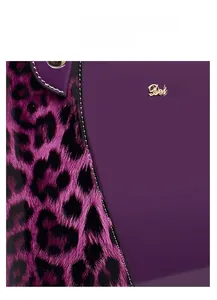 Detail of dark purple handbag showing leopard print texture and golden Dekerce logo