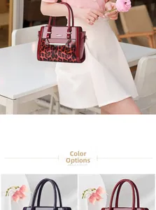 Detail view of leopard print tote bag in burgundy and purple with glossy top handles