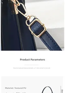 Detail of dark blue PU leather strap with golden metal buckle and spring hook