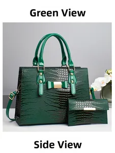 Detail of dark green crocodile texture handbag and matching wallet with gold hardware