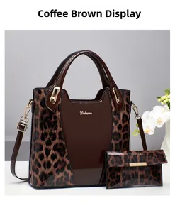 Detail view of coffee brown tote set with faux leopard panels and glossy finish
