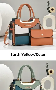 Detailed close-up of a two-piece color-block handbag set with a small matching pouch