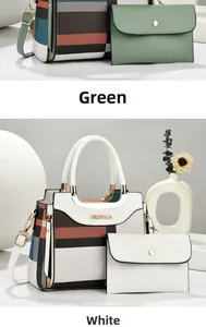 Detail of checkered handbag set with gold handles and matching clutch in green and white