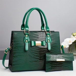 Dark green faux crocodile skin tote bag and wallet set with gold hardware and bow